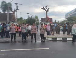 Personel Polresta Palangka Raya Laksanakan Pengamanan Star dan Finish Pawai Tahrib Ramadhan 2026