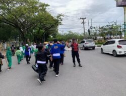 Dukung Lancarnya Acara, Personel Satsamapta Polresta Palangka Raya Amankan Pawai Tahrib Ramadhan