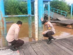 Antisipasi Dampak Banjir, Polsek Bukit Batu Cek Debit DAS Rungan
