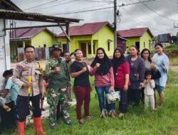 Di Petuk Katimpun, Bhabinkamtibmas Polsek Pahandut dan Warga Lakukan Kerja Bakti