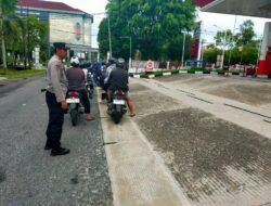 Pastikan Aktivitas Pengisian BBM Berjalan Lancar, Personel Gabungan Laksanakan PAM di SPBU Imam Bonjol