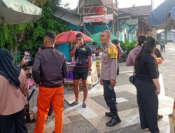 Polsek Pahandut Sampaikan Pesan Kamtibmas saat Sambangi Pelabuhan Rambang